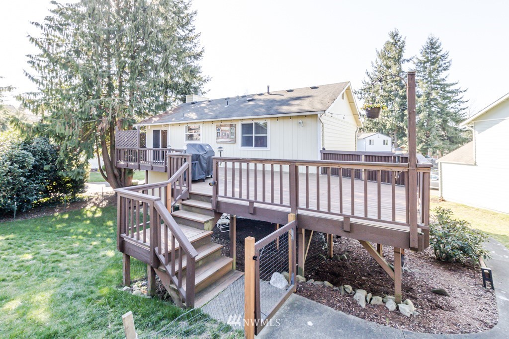 2829 Northeast 4th Court Renton, WA 98056 - Photo 24 of 26 a view of a house with backyard and sitting area