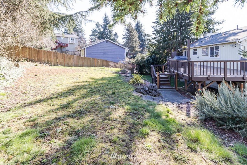 2829 Northeast 4th Court Renton, WA 98056 - Photo 25 of 26 a view of a house with backyard and sitting area