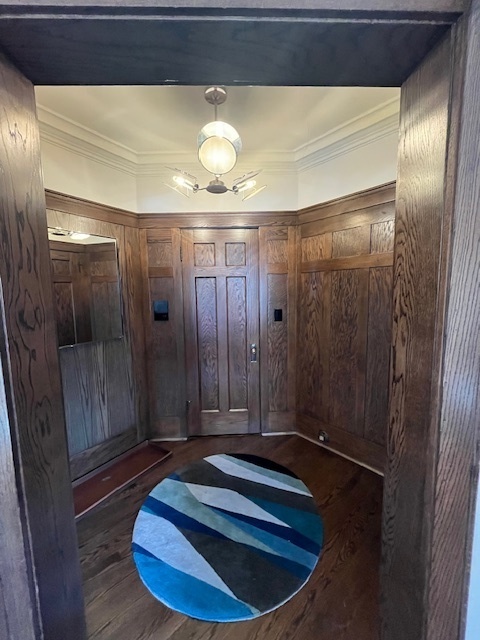 1372 East 57th Street, Unit 2 Chicago, IL 60637 - Photo 2 of 13 a room with a glass door and shower