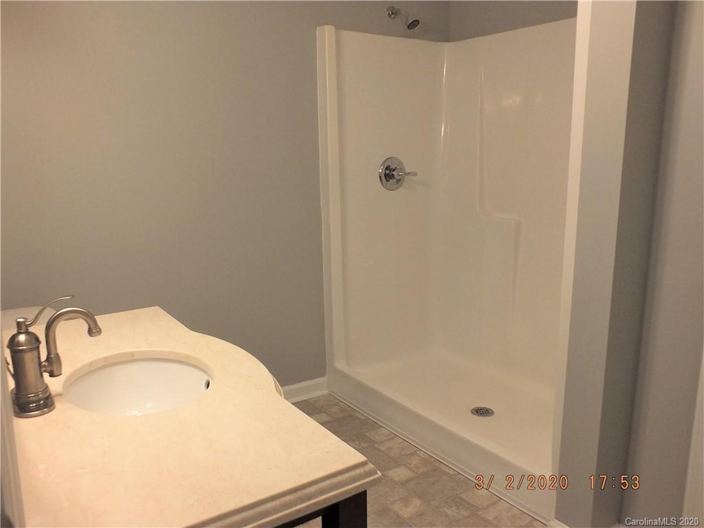 2035 Knight Road Lancaster, SC 29720 - Photo 11 of 26 a bathroom with a sink and vanity