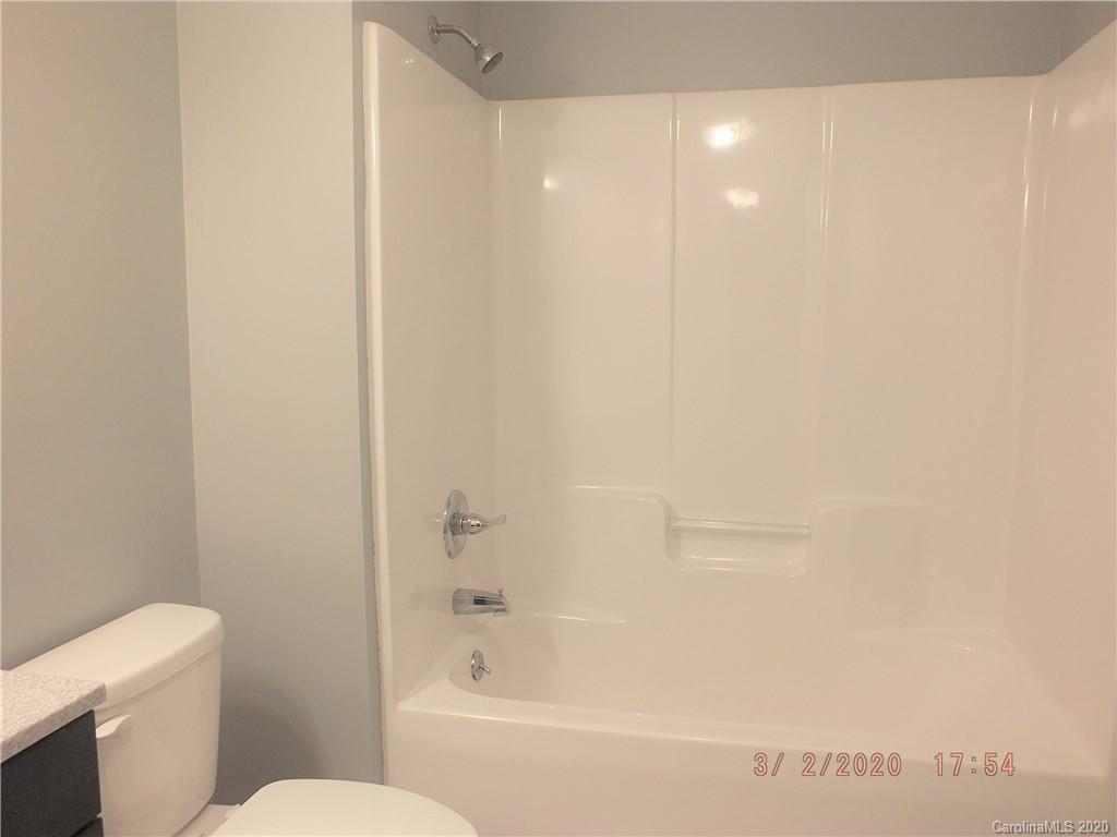 2035 Knight Road Lancaster, SC 29720 - Photo 21 of 26 a bathroom with a shower and a toilet