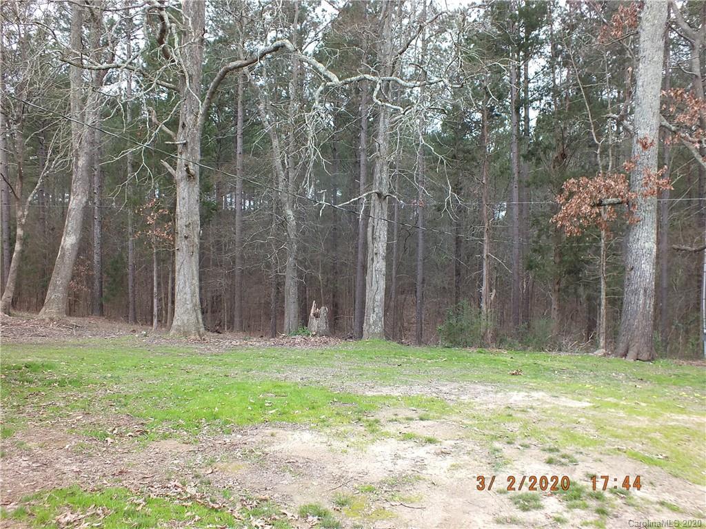 2035 Knight Road Lancaster, SC 29720 - Photo 23 of 26 a backyard of a house with lots of green space