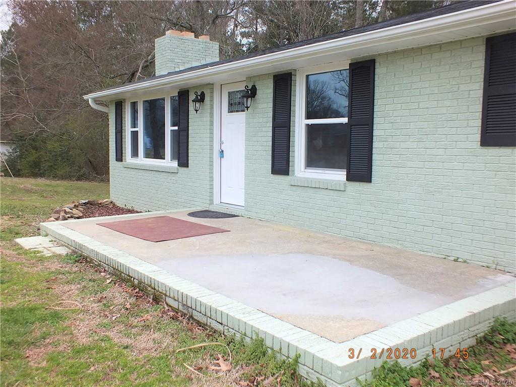 2035 Knight Road Lancaster, SC 29720 - Photo 26 of 26 a front view of a house with garden