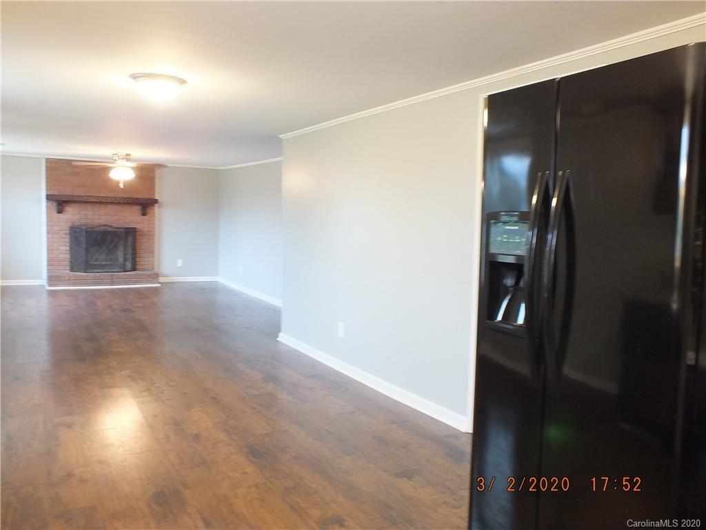 2035 Knight Road Lancaster, SC 29720 - Photo 8 of 26 a view of an empty room with a fireplace