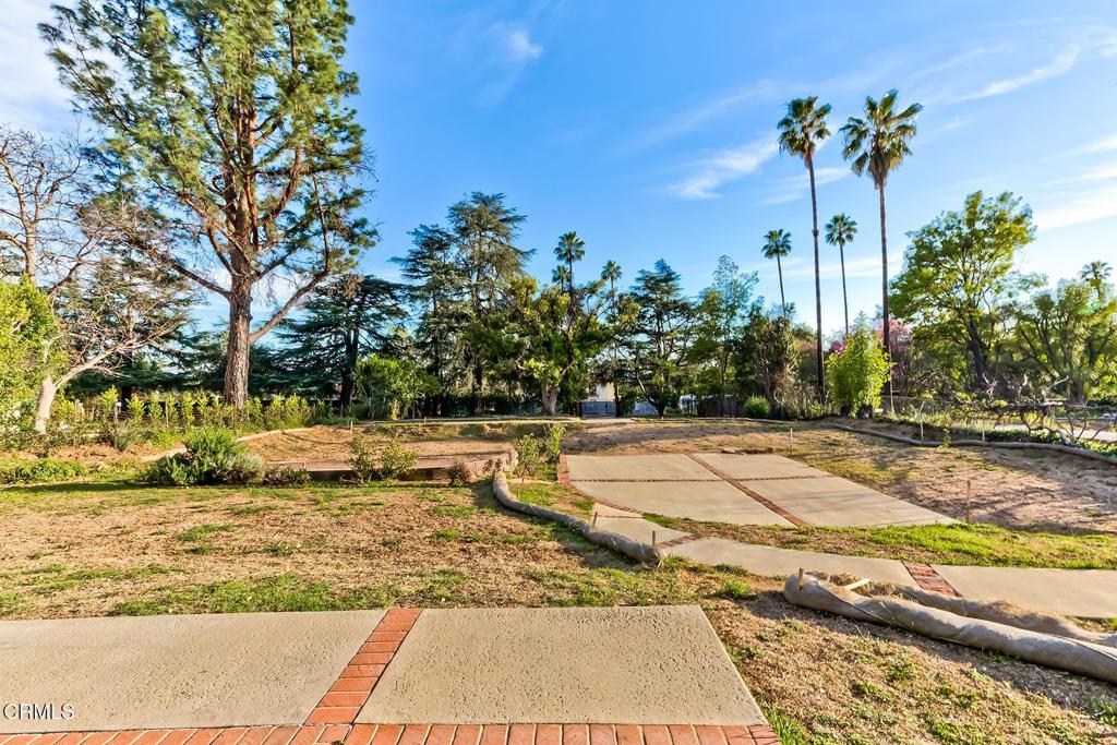 1277 Rubio Street Altadena, CA 91001 - Photo 10 of 19 a view of a swimming pool with a yard