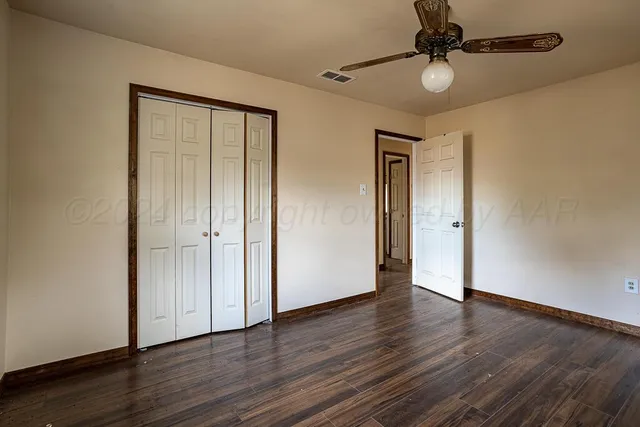 a bathroom with a sink toilet and vanity