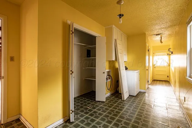 a bathroom with a toilet sink and a mirror