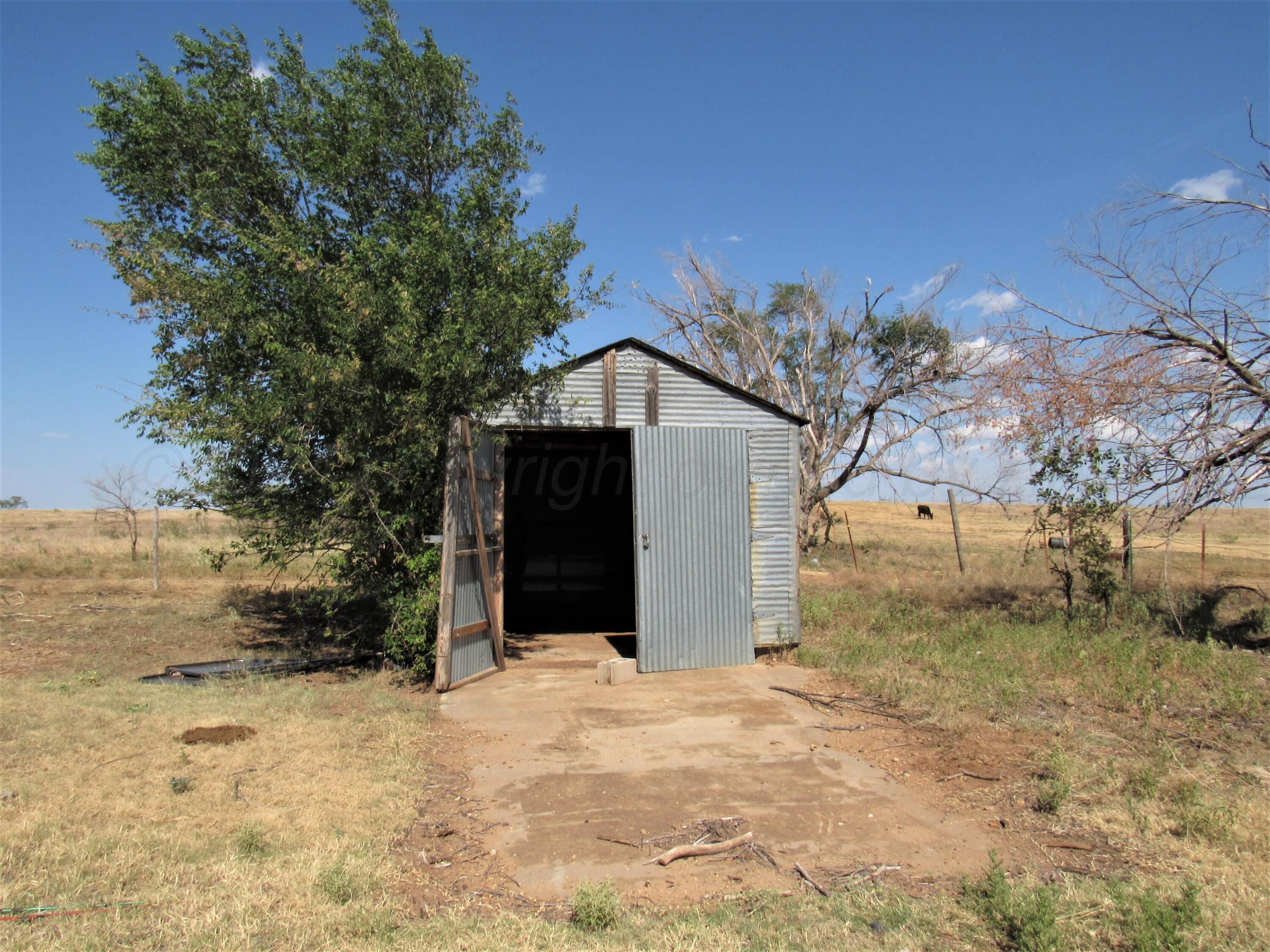 6761 County Road 11 Shamrock, TX 79079 - Photo 19 of 33 a view of a house with a yard