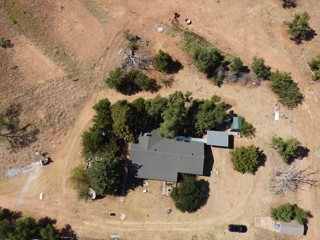 a view of beach and yard