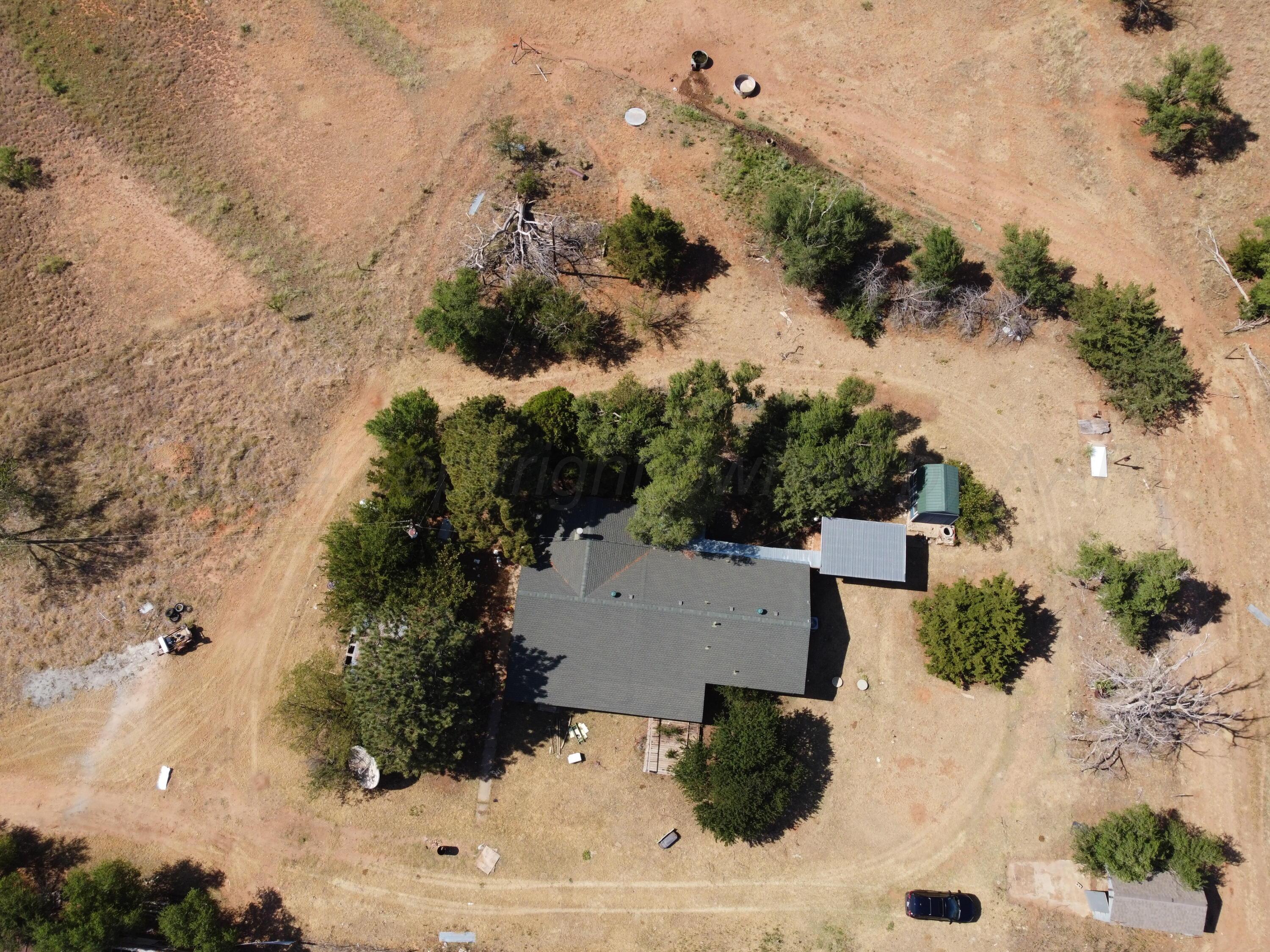 6761 County Road 11 Shamrock, TX 79079 - Photo 30 of 33 an aerial view of residential house with outdoor space