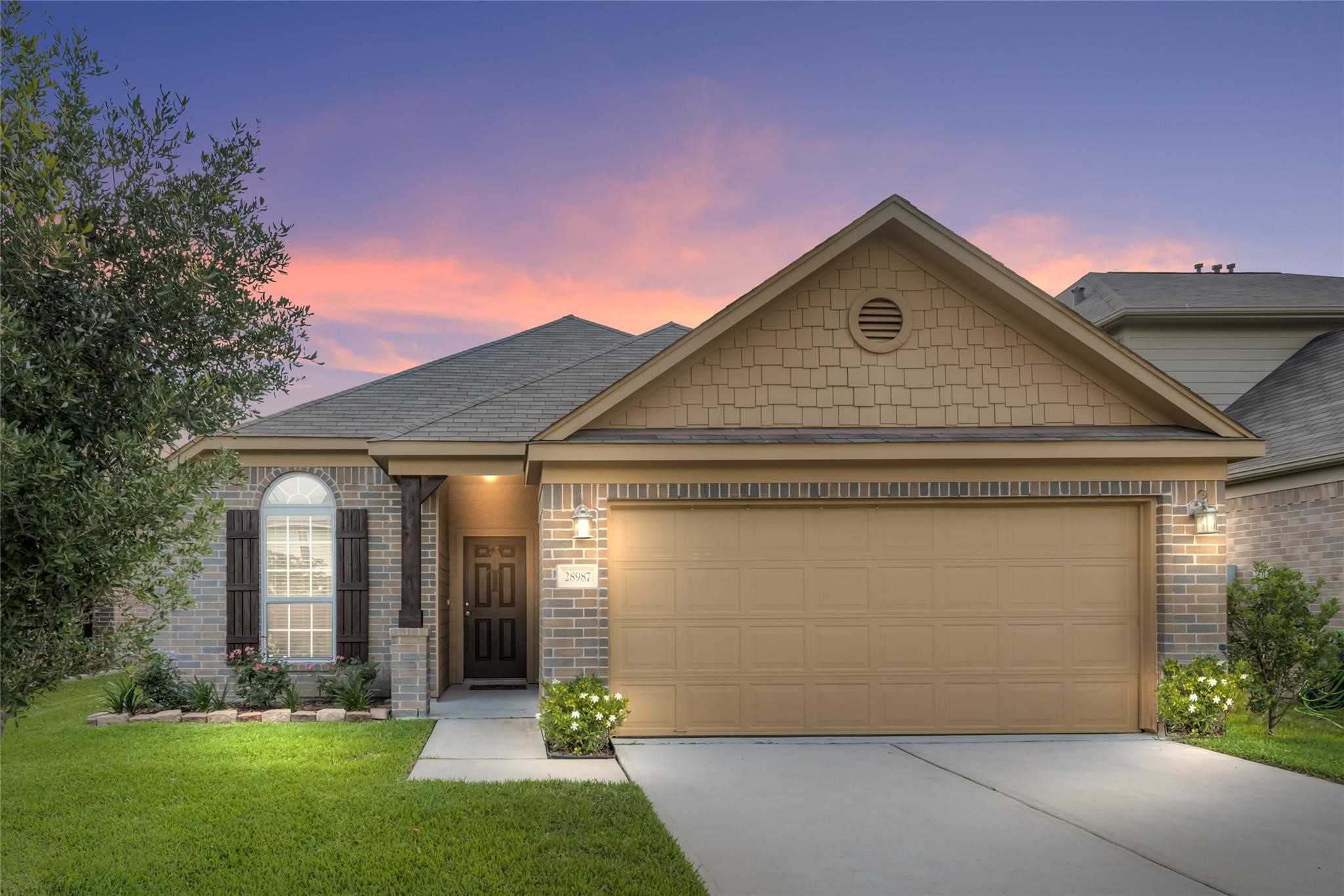 28987 Birch Green Way Spring, TX 77386 - Photo 1 of 32 a front view of house with yard and green space