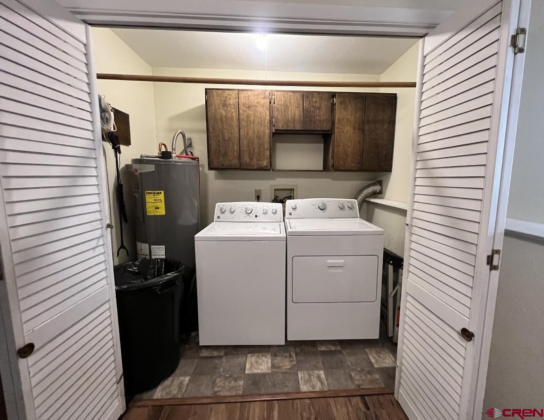 1328 Jackson Street Cortez, CO 81321 - Photo 12 of 37 a utility room with dryer and washer