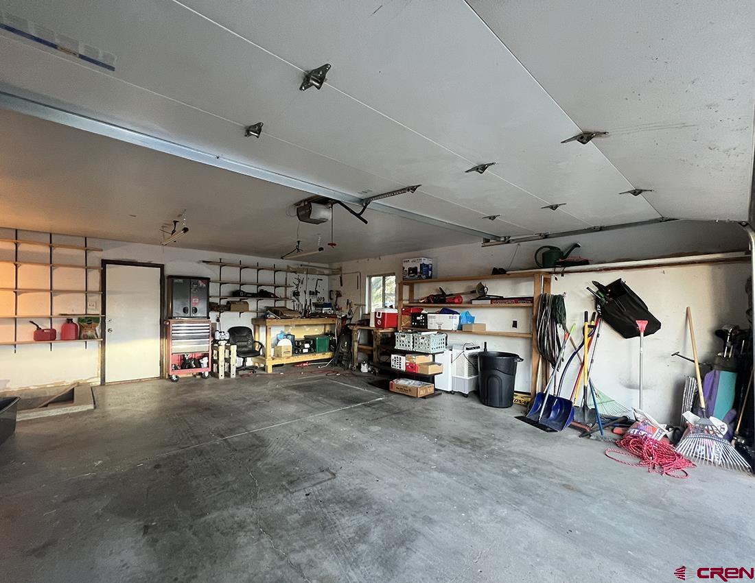 1328 Jackson Street Cortez, CO 81321 - Photo 14 of 37 a view of parking garage with cars