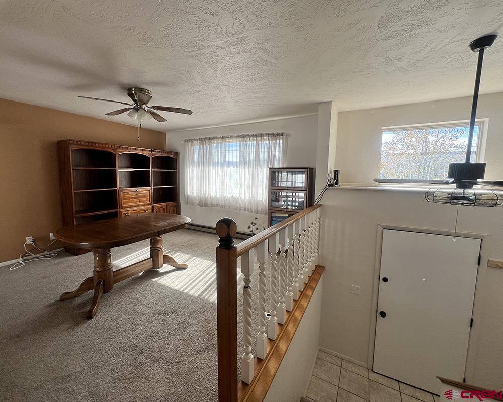 1328 Jackson Street Cortez, CO 81321 - Photo 15 of 37 a view of a livingroom with furniture and windows