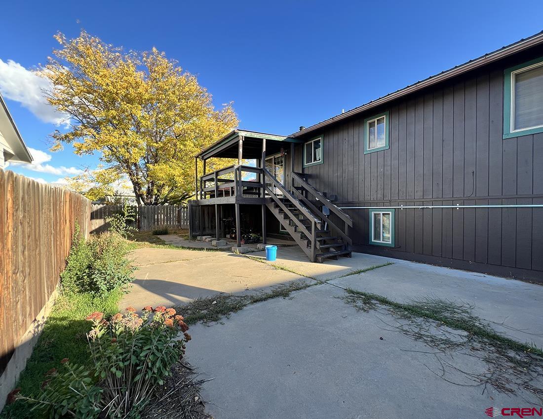 1328 Jackson Street Cortez, CO 81321 - Photo 29 of 37 a view of a backyard with wooden fence