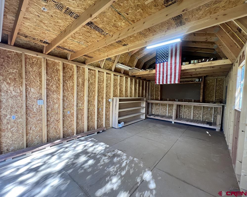 1328 Jackson Street Cortez, CO 81321 - Photo 33 of 37 a view of an empty room with a balcony