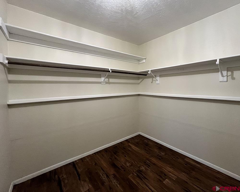 1328 Jackson Street Cortez, CO 81321 - Photo 9 of 45 a view of a room with wooden floor