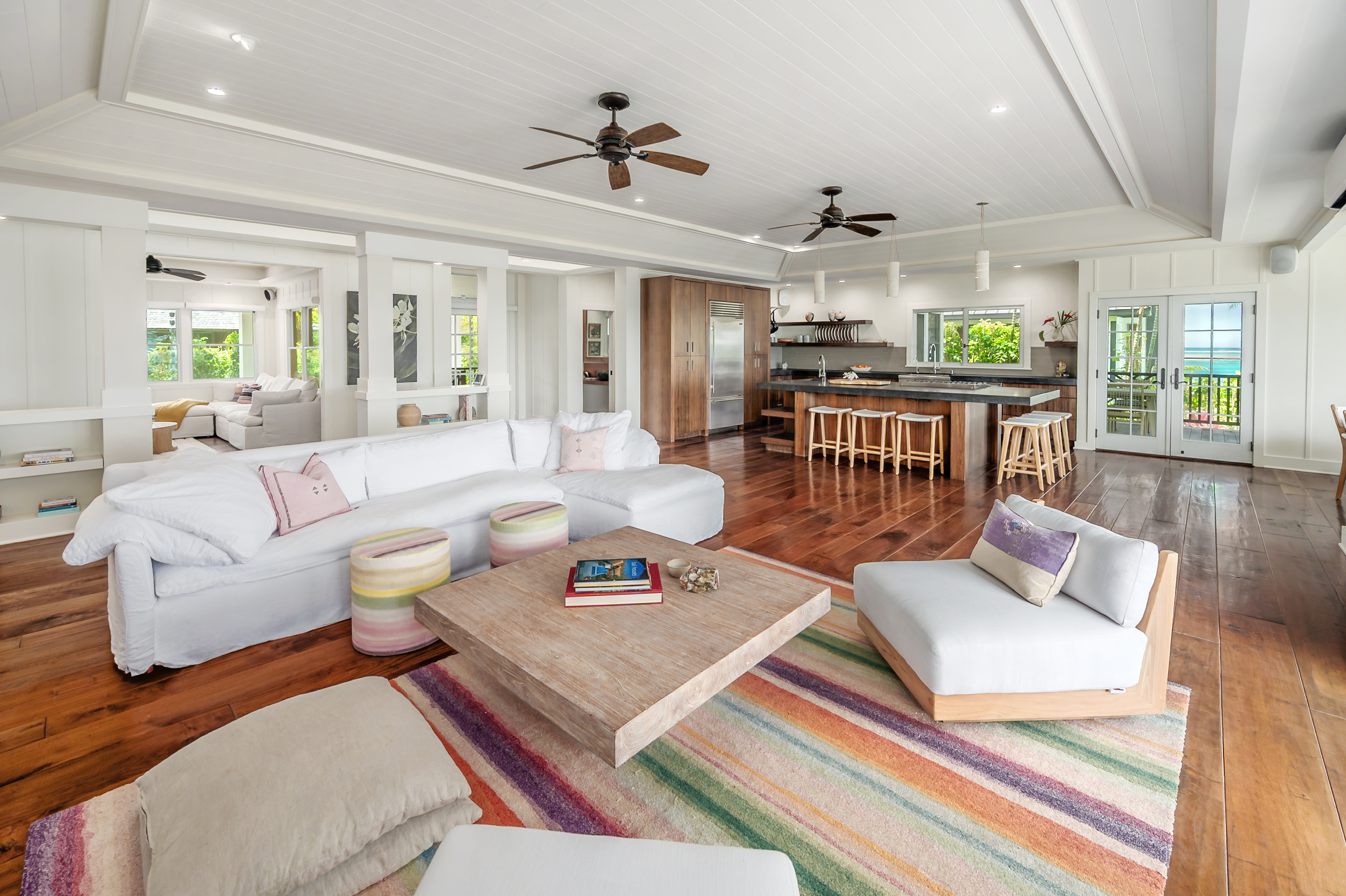7336 Alealea Road Hanalei, HI 96714 - Photo 4 of 30 a living room with furniture and a chandelier