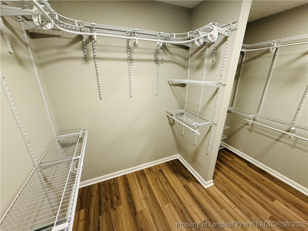 300 Wedge Court Hope Mills, NC 28348 - Photo 21 of 26 a view of a room with racks on the wall