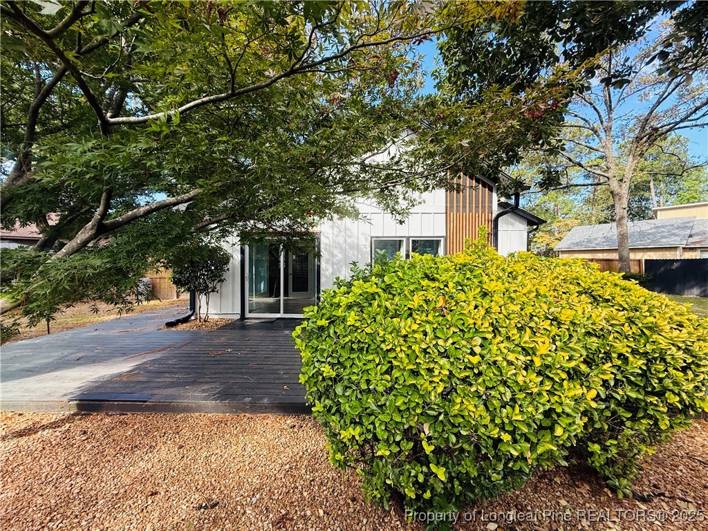 300 Wedge Court Hope Mills, NC 28348 - Photo 25 of 26 a front view of a house with a garden