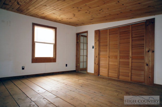 1994 Chestnut Grove Road Boone, NC 28607 - Photo 27 of 43 a view of an empty room with a window