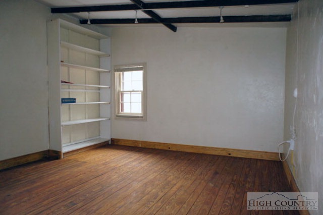 1994 Chestnut Grove Road Boone, NC 28607 - Photo 34 of 43 a view of a room with wooden floor and a window