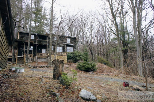 1994 Chestnut Grove Road Boone, NC 28607 - Photo 6 of 43 a backyard of a house with lots of green space