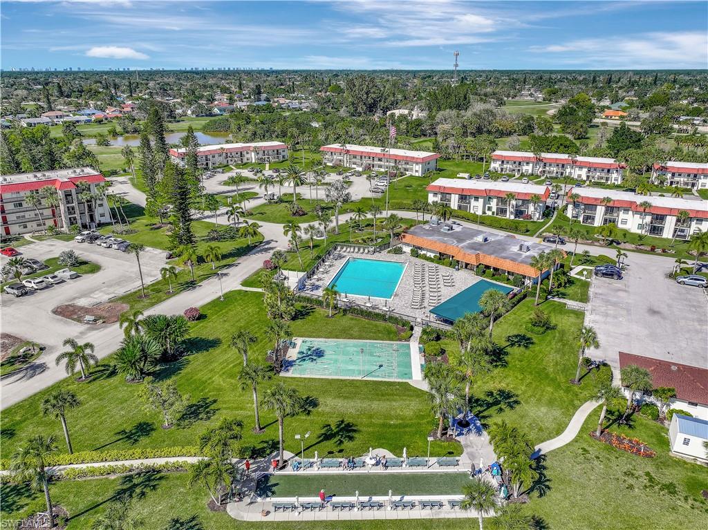 4357 27th Court Southwest, Unit 101 Naples, FL 34116 - Photo 2 of 25 an aerial view of multiple house