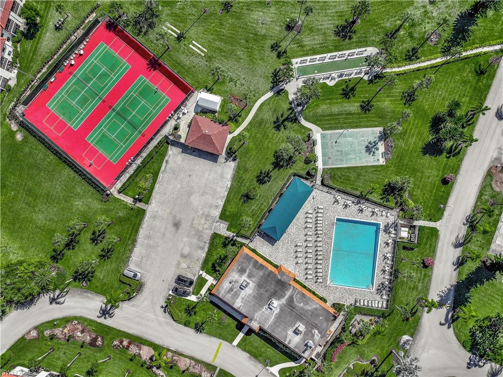 4357 27th Court Southwest, Unit 101 Naples, FL 34116 - Photo 25 of 25 an aerial view of a house