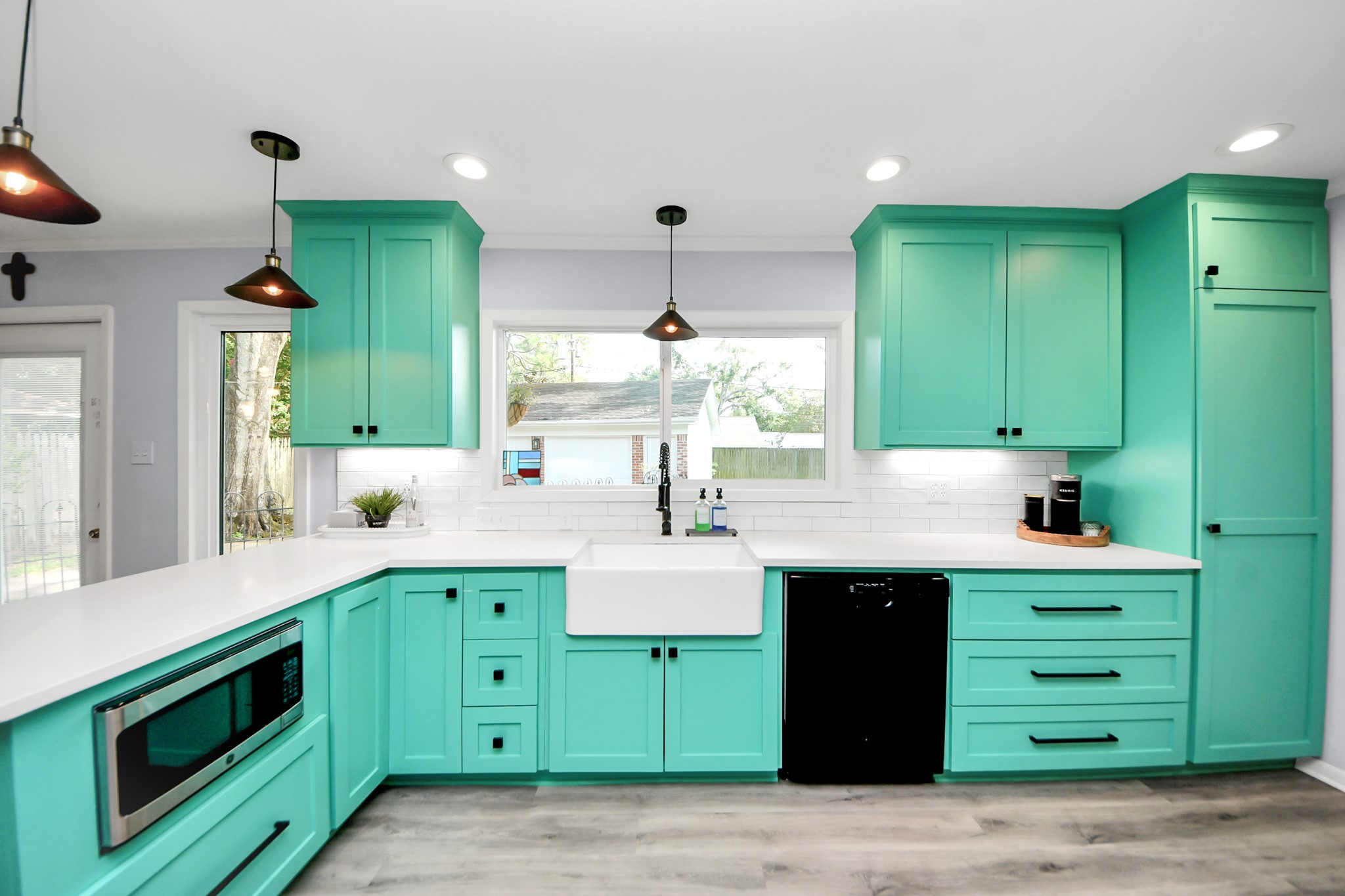 205 Cedar Lane El Lago, TX 77586 - Photo 11 of 44 a kitchen with a sink and cabinets