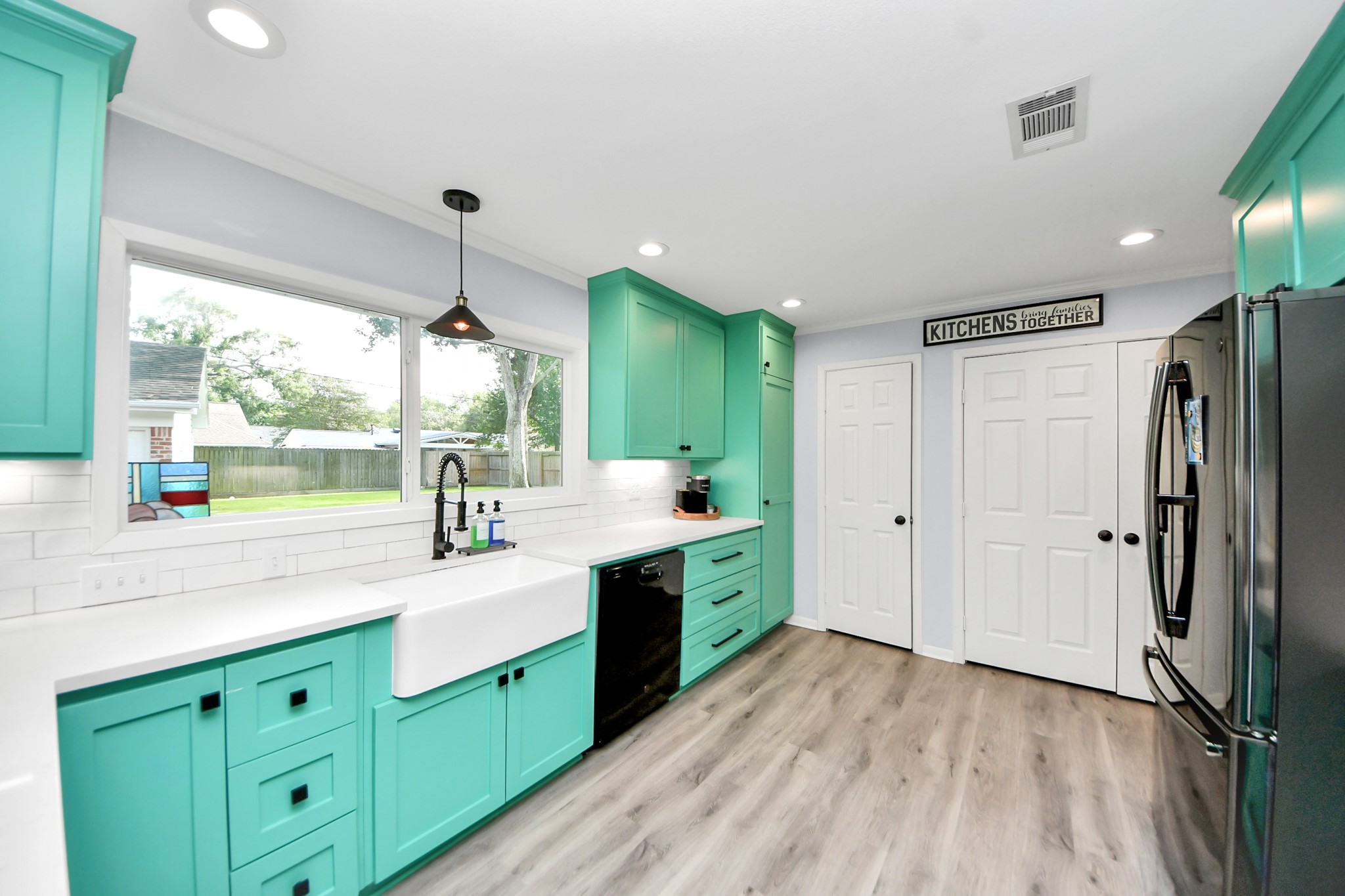 205 Cedar Lane El Lago, TX 77586 - Photo 12 of 44 a spacious bathroom with a double vanity sink a mirror and a shower