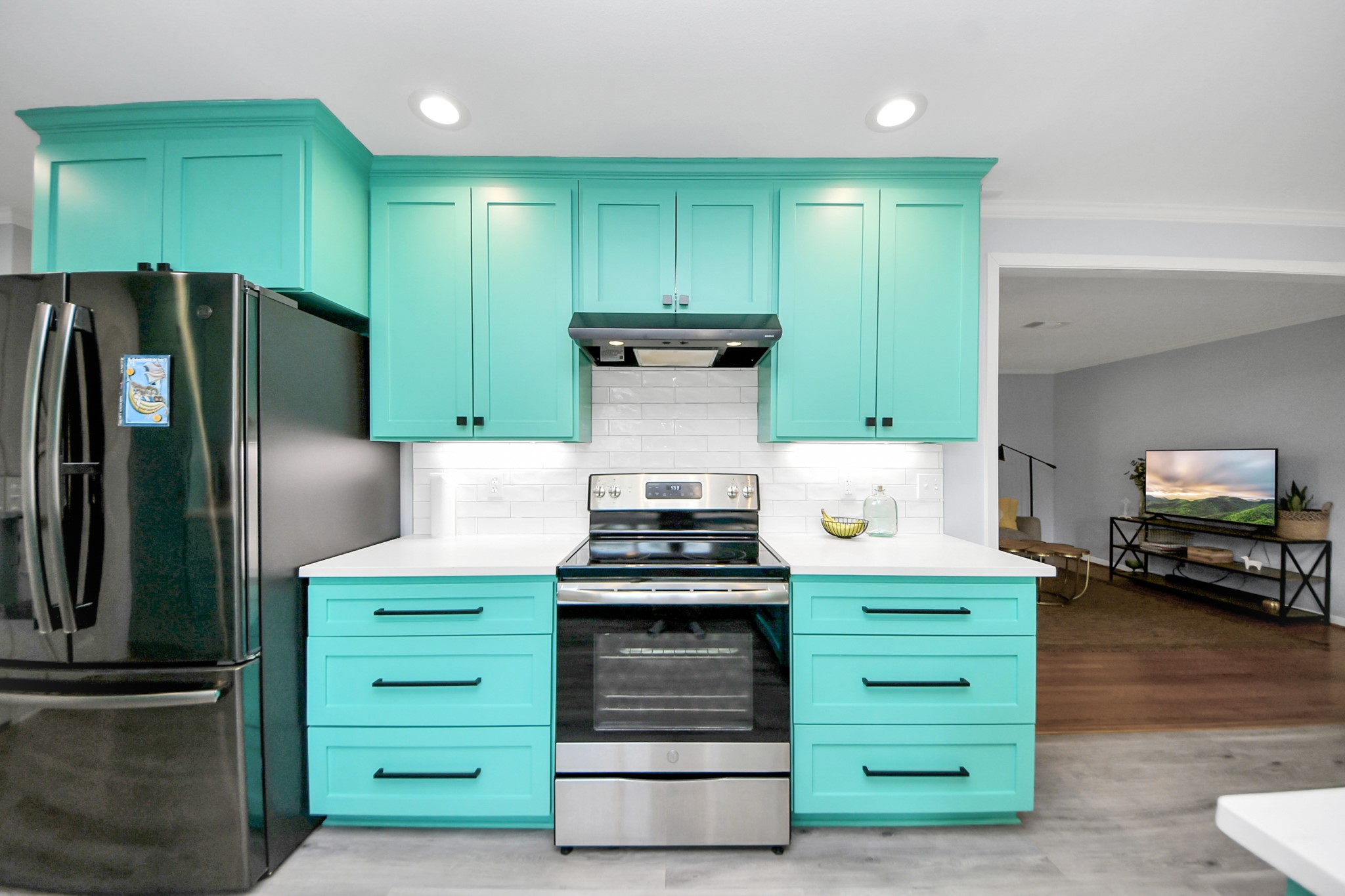 205 Cedar Lane El Lago, TX 77586 - Photo 13 of 44 a kitchen with a stove and a refrigerator