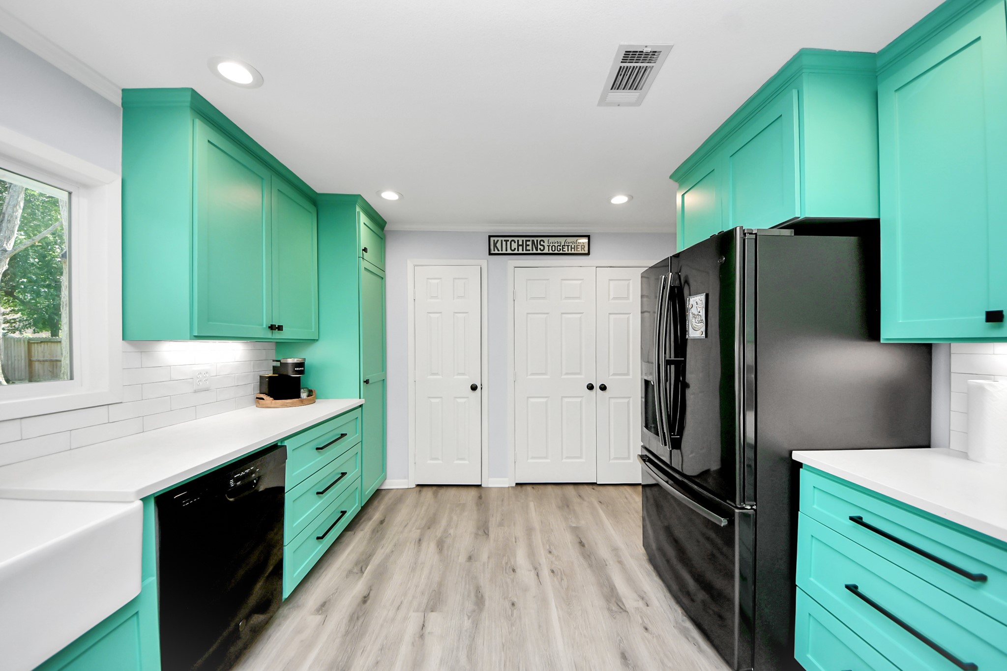 205 Cedar Lane El Lago, TX 77586 - Photo 15 of 44 a kitchen with stainless steel appliances a refrigerator and a sink
