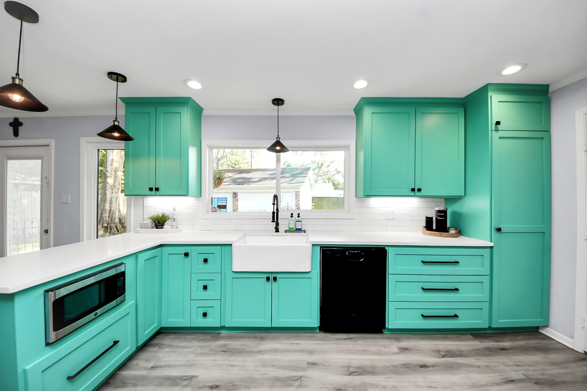 205 Cedar Lane El Lago, TX 77586 - Photo 19 of 44 a kitchen with a sink and cabinets