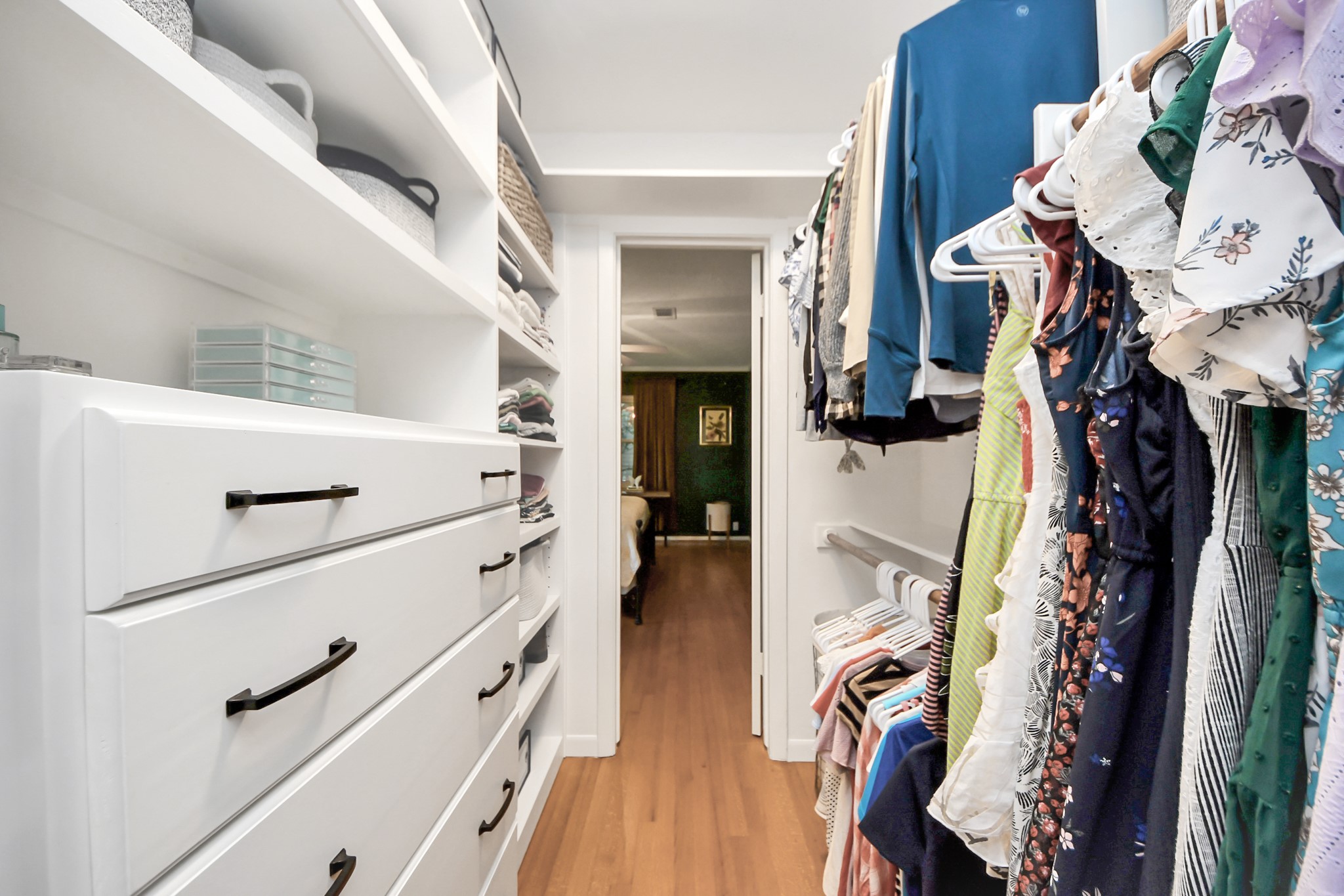 205 Cedar Lane El Lago, TX 77586 - Photo 23 of 44 a view of walk in closet with clothes and shoes