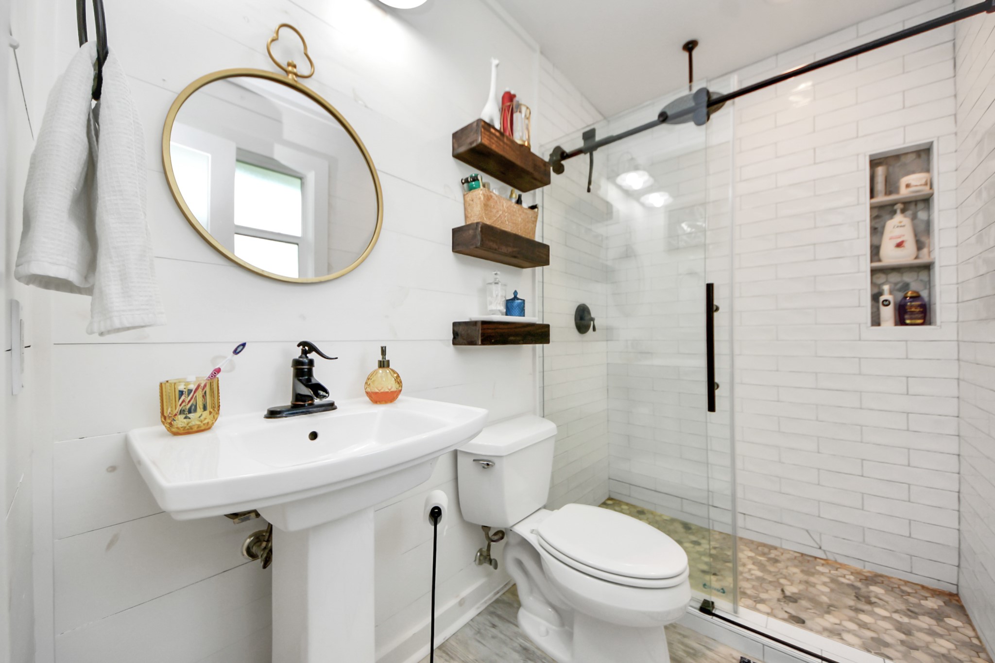 205 Cedar Lane El Lago, TX 77586 - Photo 24 of 44 a bathroom with a sink and a mirror