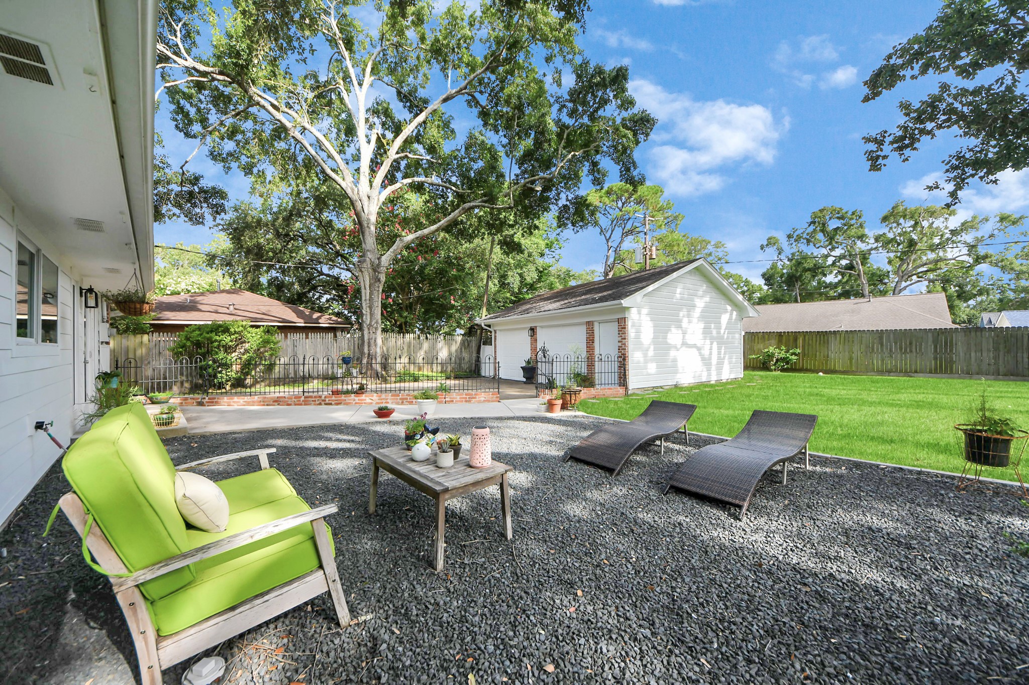 205 Cedar Lane El Lago, TX 77586 - Photo 33 of 44 a view of backyard with outdoor seating and green space