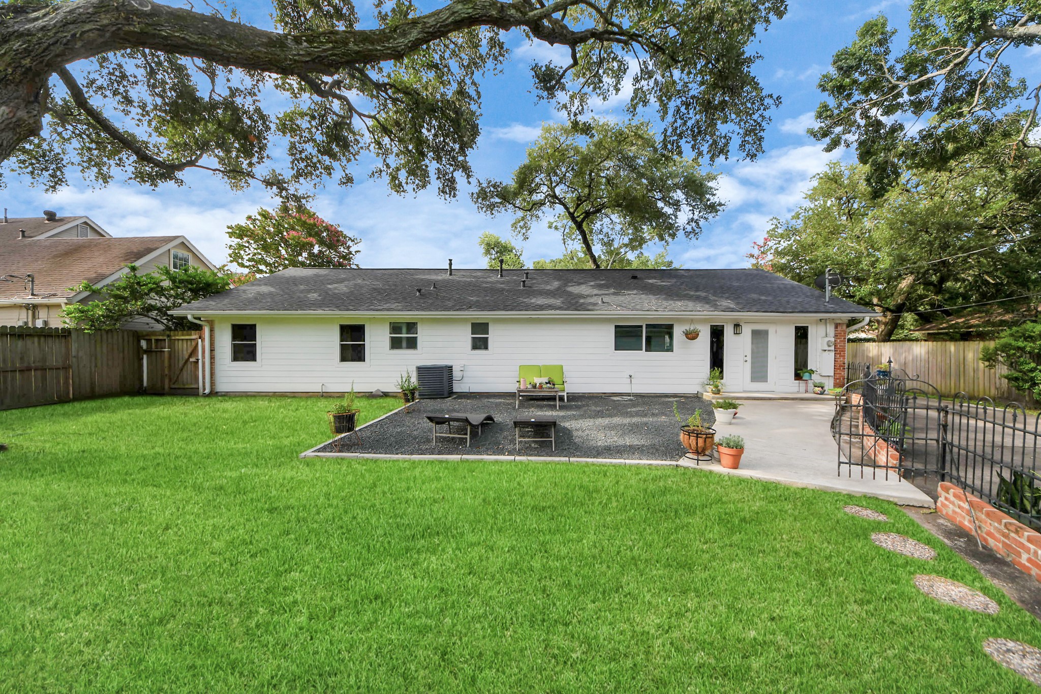 205 Cedar Lane El Lago, TX 77586 - Photo 35 of 44 a front view of a house with a yard and trees
