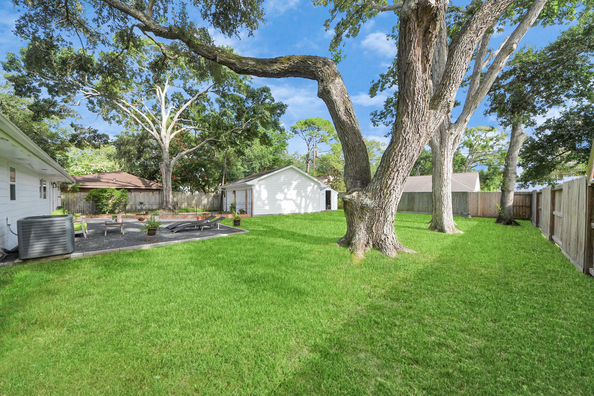 205 Cedar Lane El Lago, TX 77586 - Photo 36 of 44 a view of a house with backyard and a tree