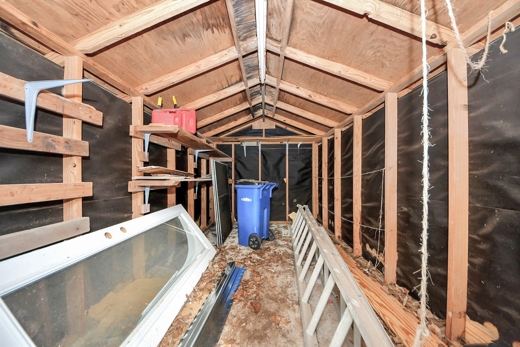 205 Cedar Lane El Lago, TX 77586 - Photo 40 of 44 a view of a house with wooden floor and a iron gate