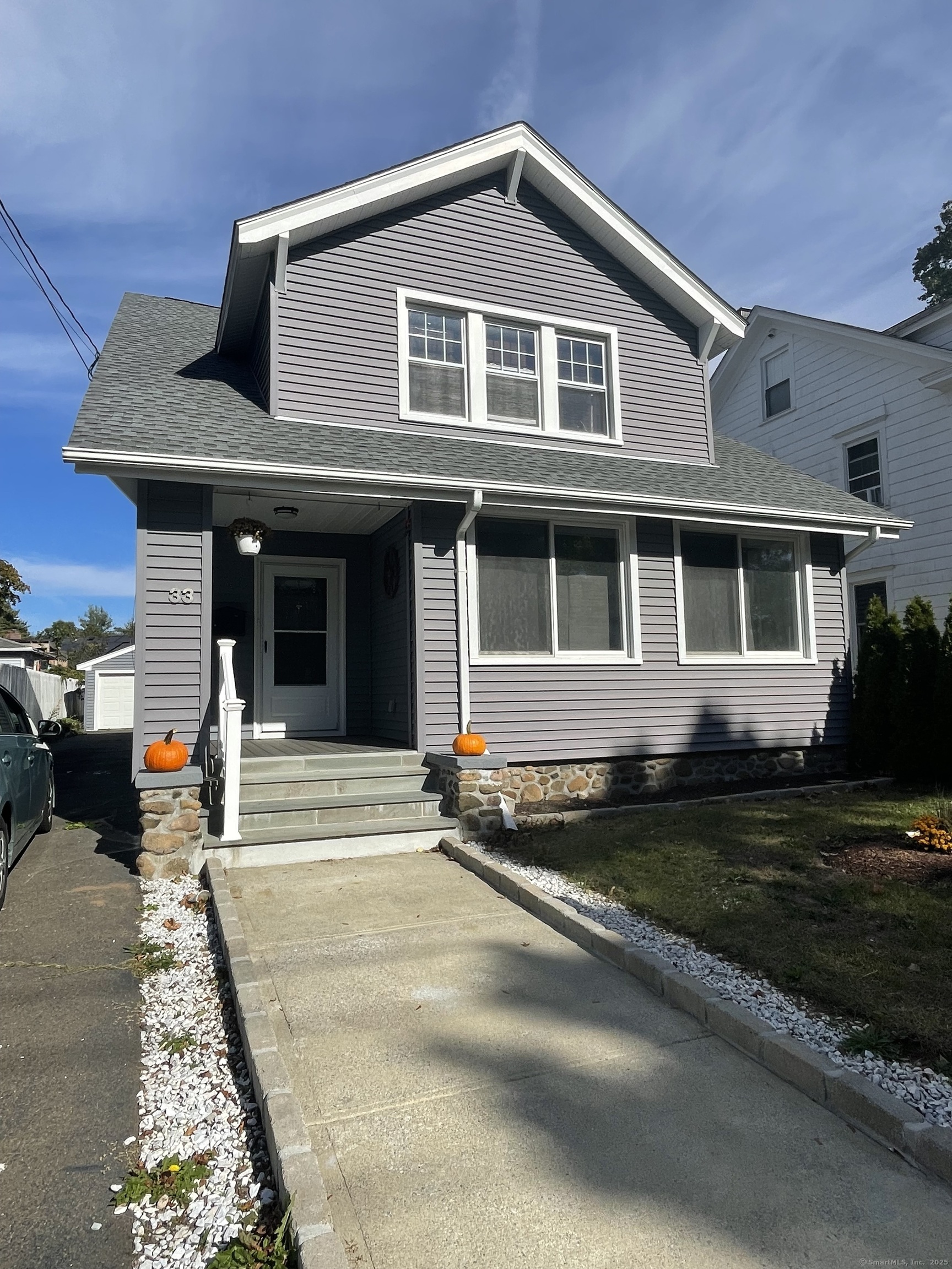 33 Mather Street Hamden, CT 06517 - Photo 1 of 22 a front view of a house with a yard