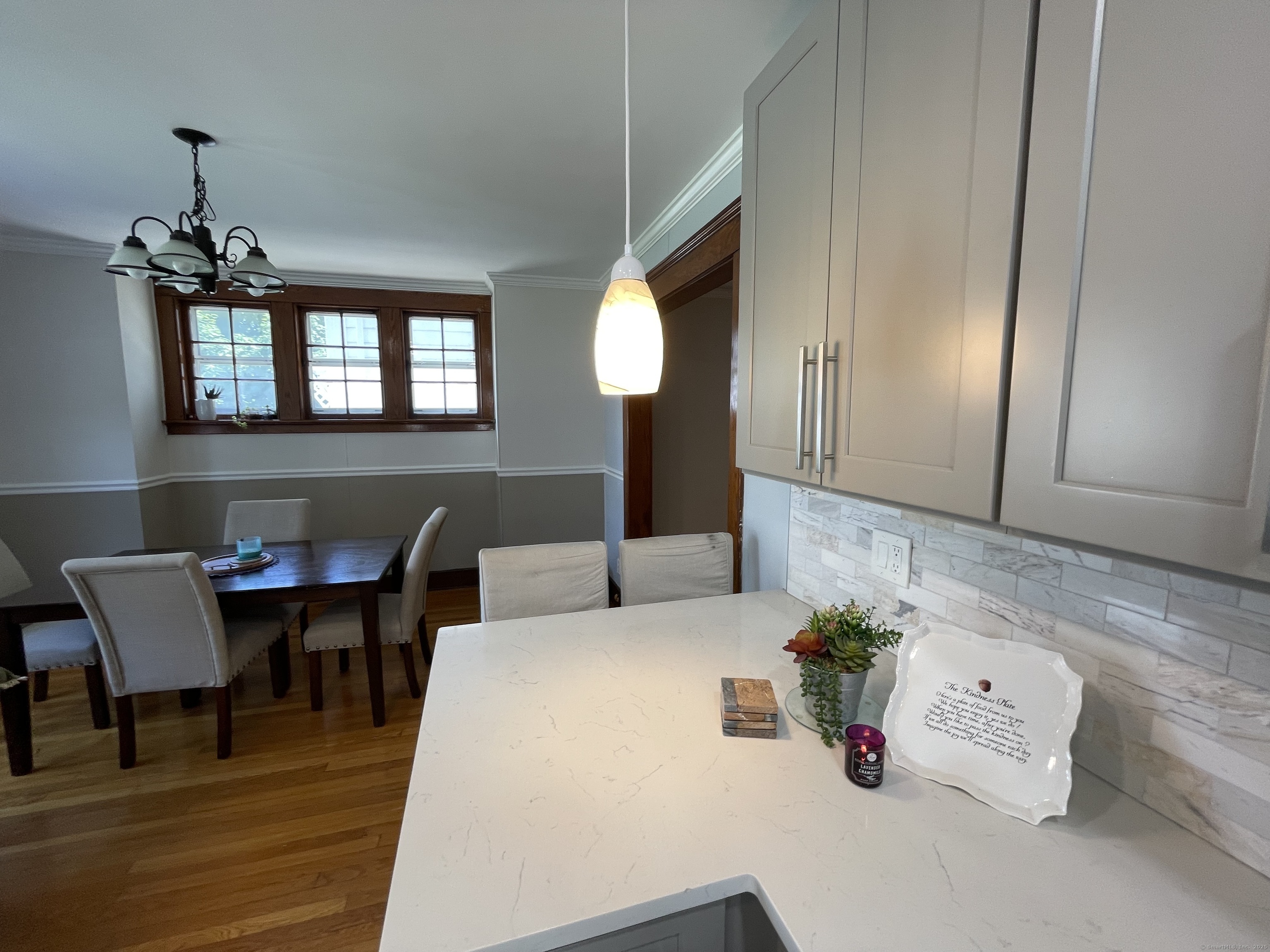 33 Mather Street Hamden, CT 06517 - Photo 11 of 22 a view of a dining room with furniture and window