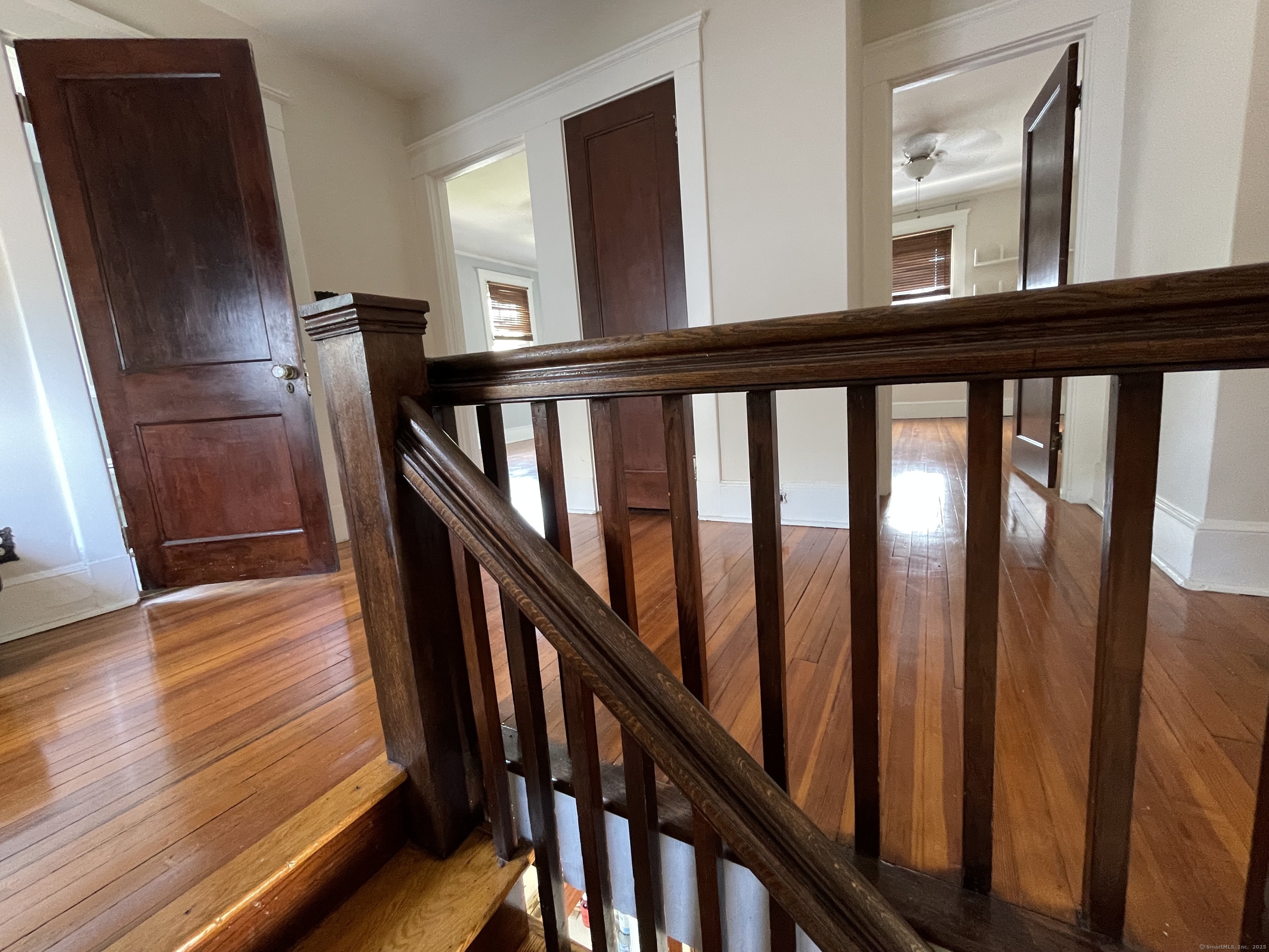33 Mather Street Hamden, CT 06517 - Photo 6 of 22 a view of staircase with railing and a window