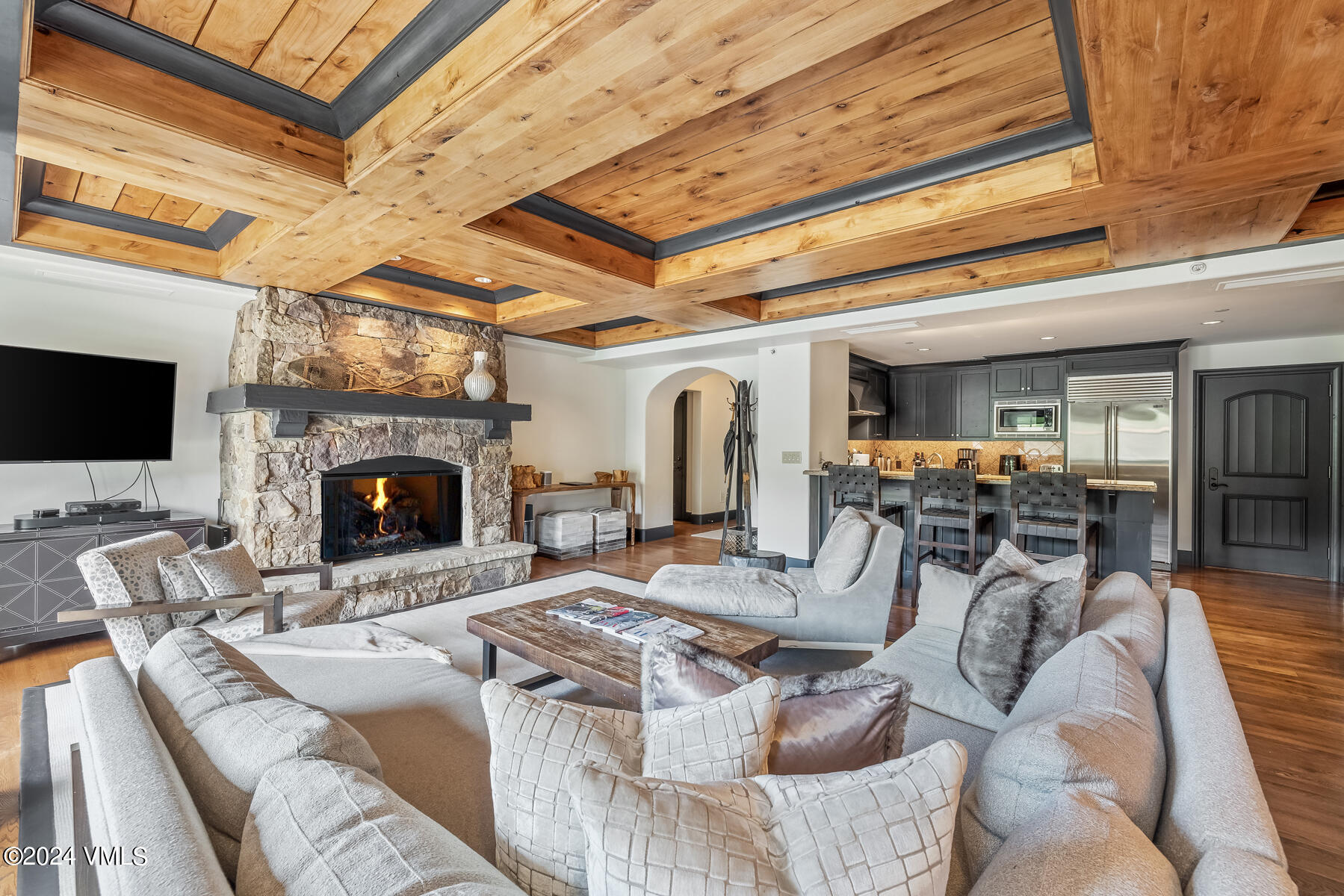 a view of a livingroom with furniture and a fireplace