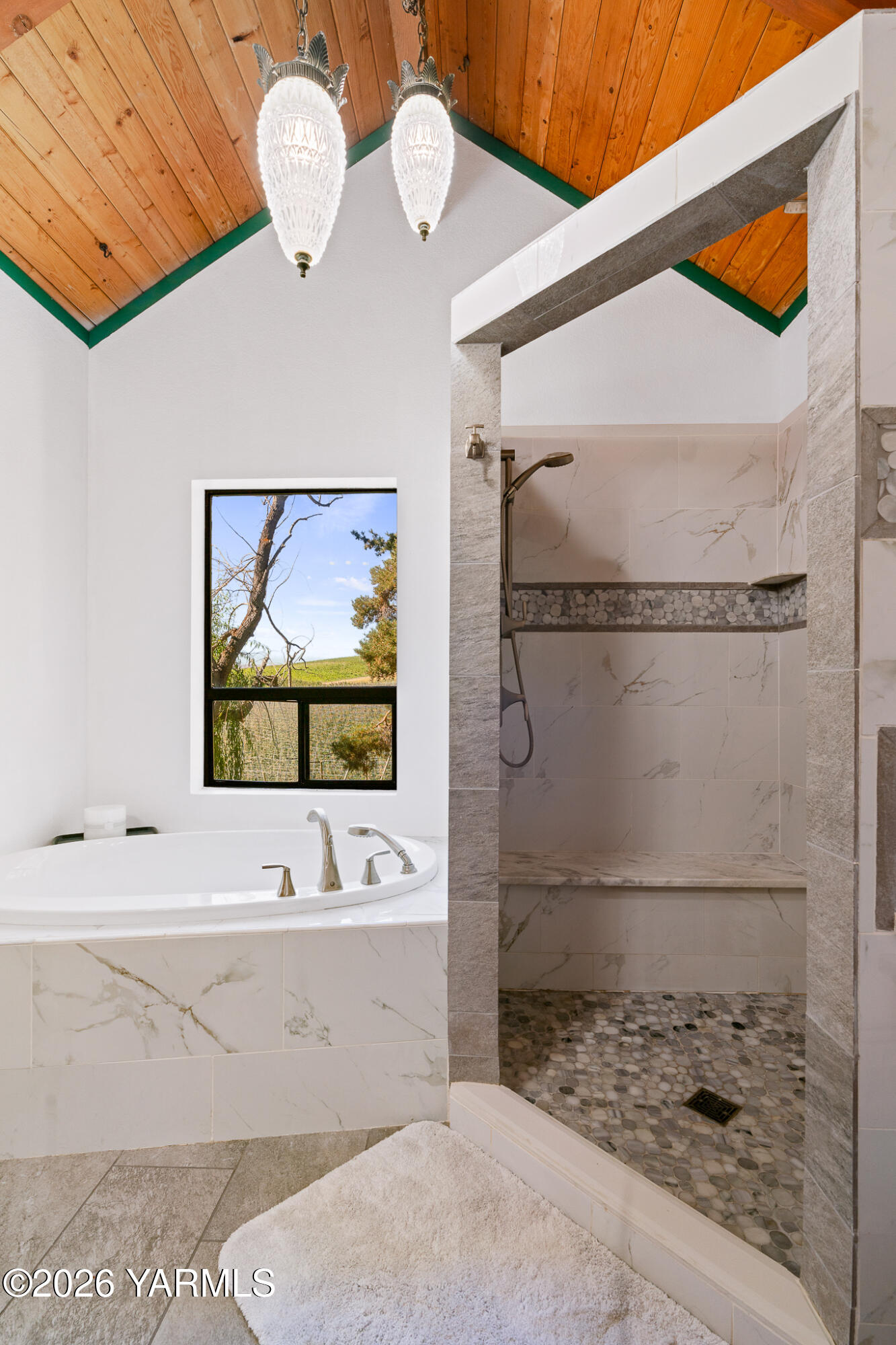 13619 Summitview Ext Road Yakima, WA 98908 - Photo 35 of 56 a bathroom with a sink a mirror and a shower