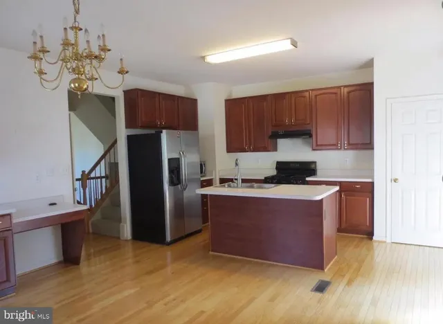 a room with pool table and flat screen tv