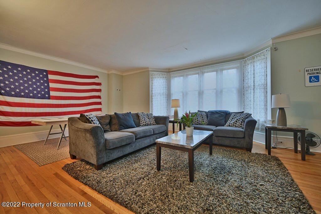 811 Olive Street Scranton, PA 18510 - Photo 12 of 54 a living room with furniture and a rug