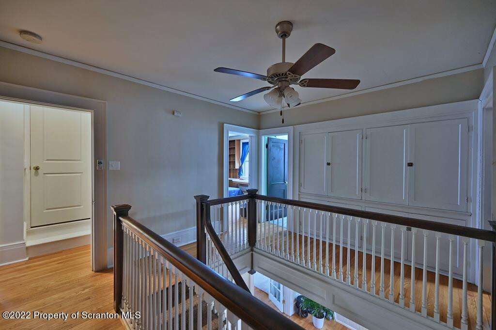 811 Olive Street Scranton, PA 18510 - Photo 23 of 54 a view of a hallway with a hardwood floor