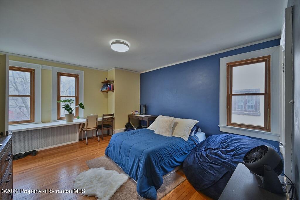 811 Olive Street Scranton, PA 18510 - Photo 47 of 54 a bedroom with furniture and windows