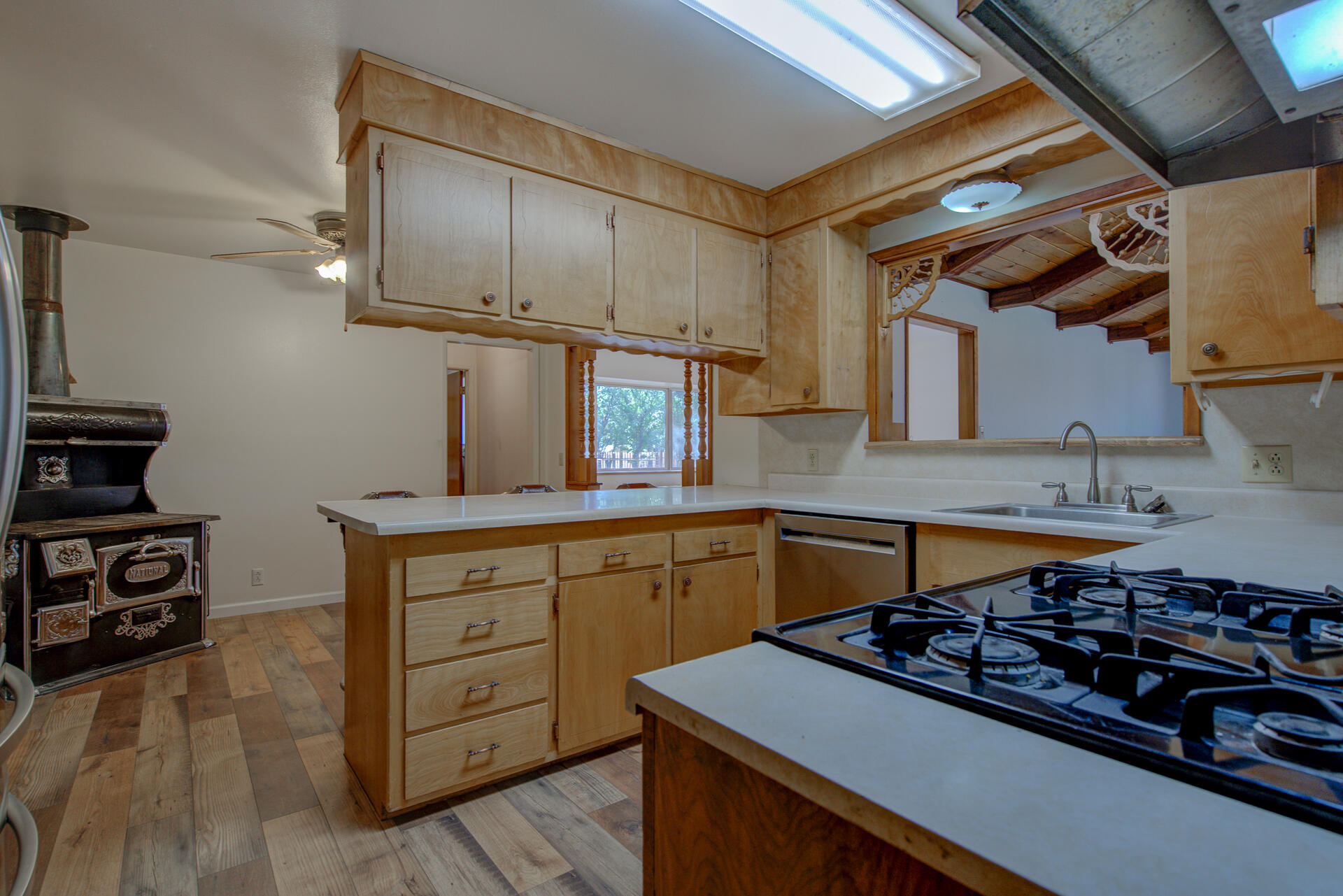 21694 Cassel Road Cassel, CA 96016 - Photo 22 of 65 a kitchen with wooden cabinets and appliances